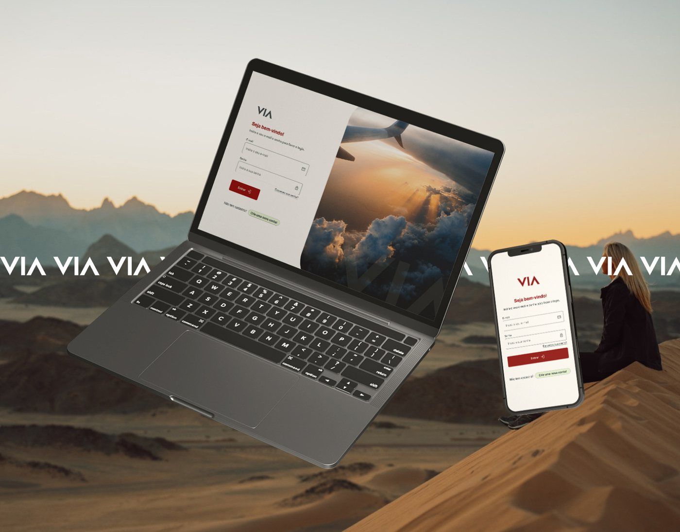 VIA Webapp em notebook e celular sobre dunas ao pôr do sol